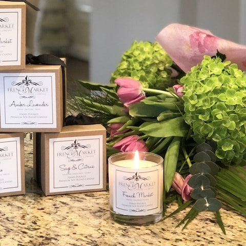 candles on a counter with flowers